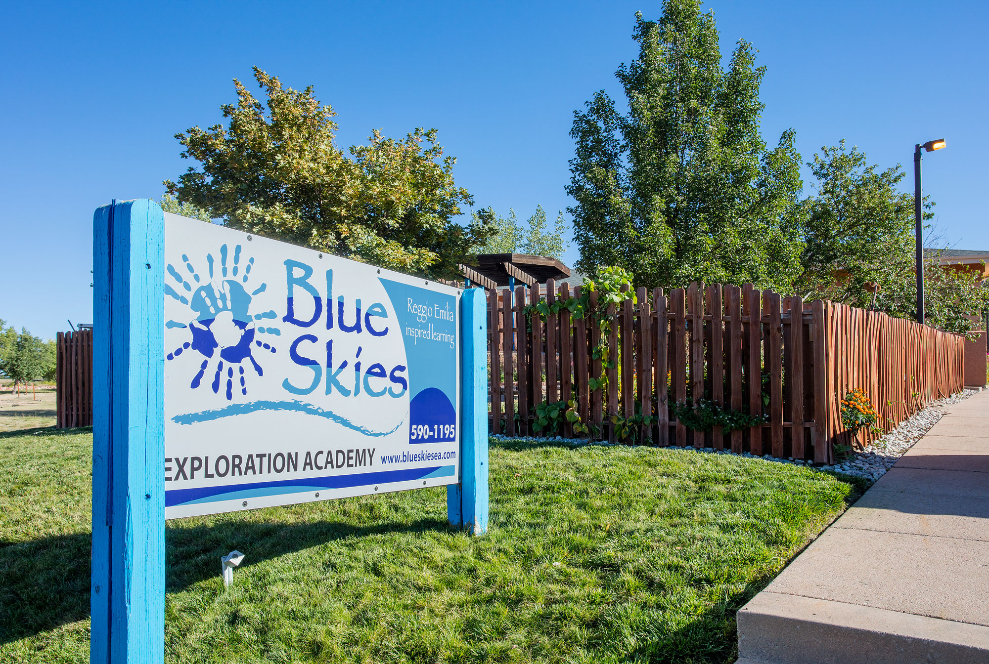 Image of Blue Skies sign in front of the learning center.